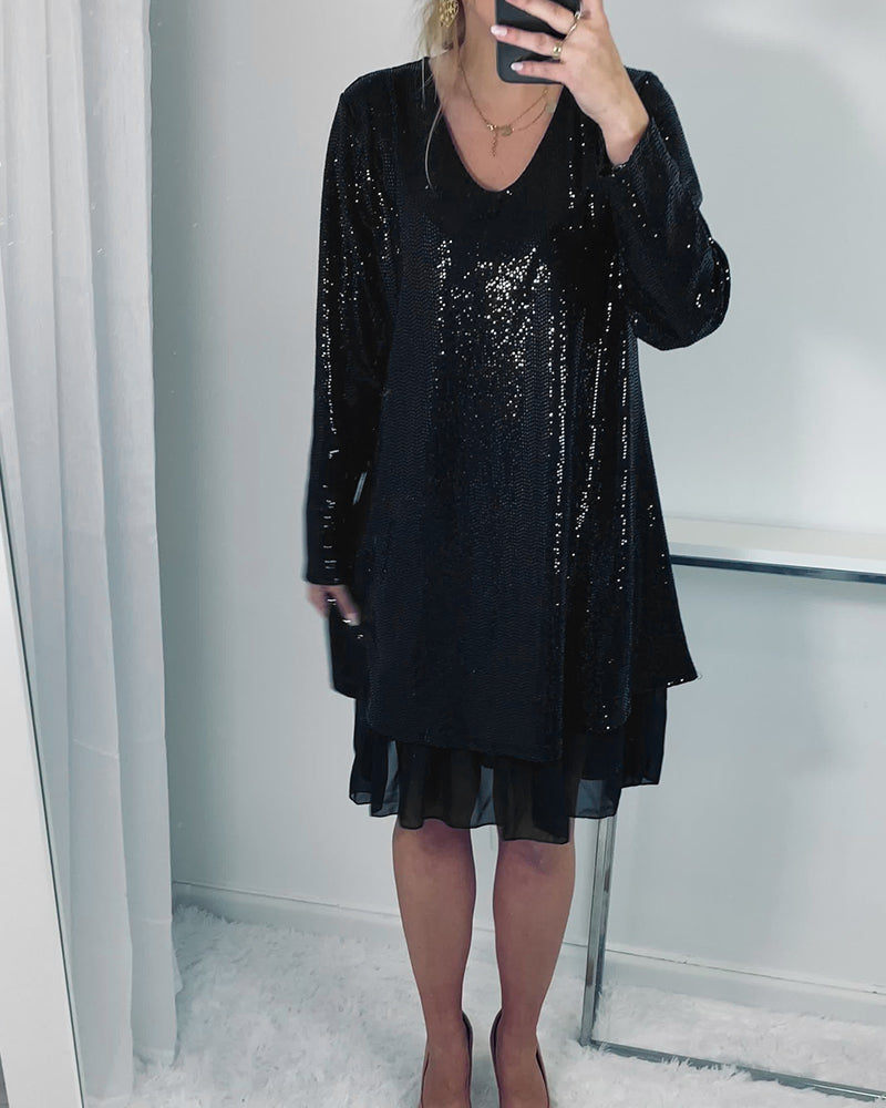 Elegant løs kjole med lang erm