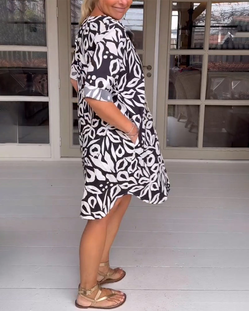 Printet kjole med v-hals