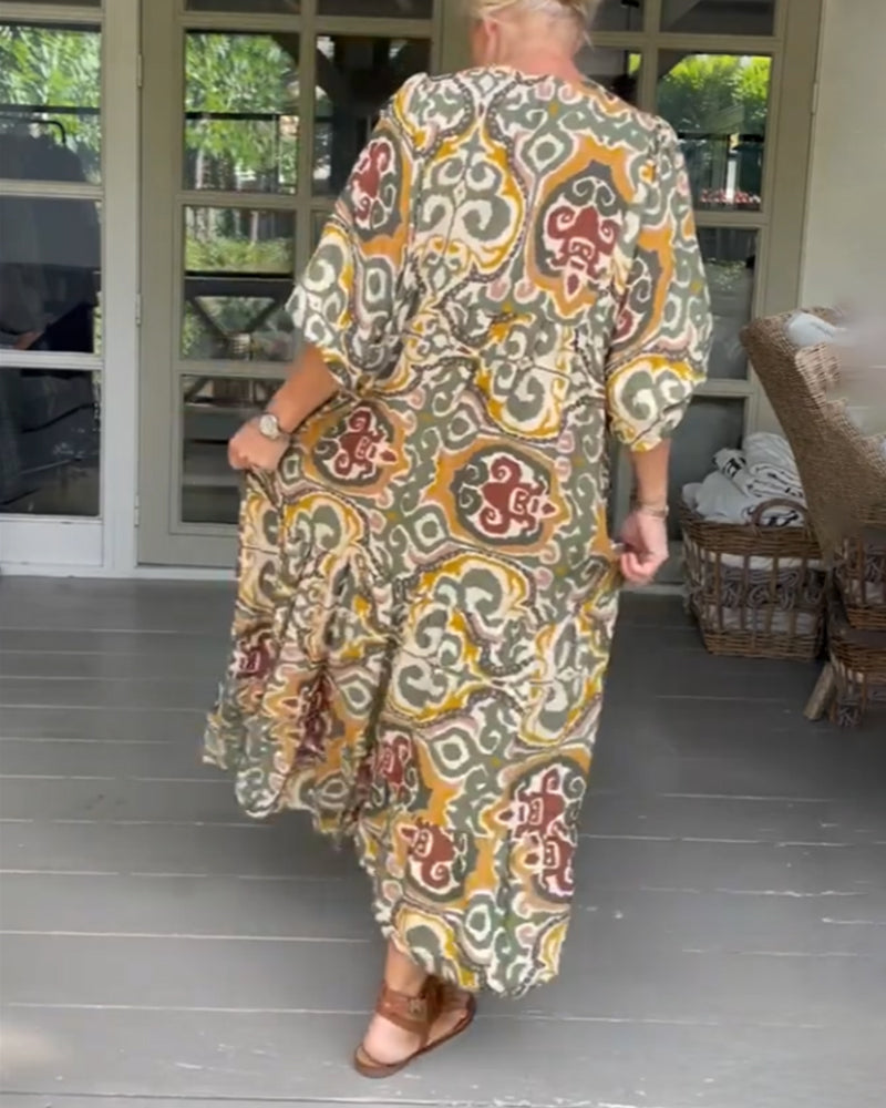 Maxikjole med trykk og V-hals