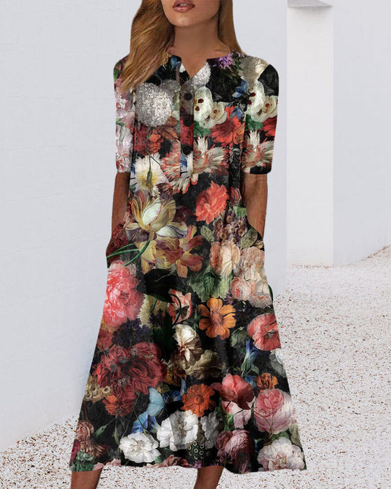 Kjole i blomsterprint med lomme