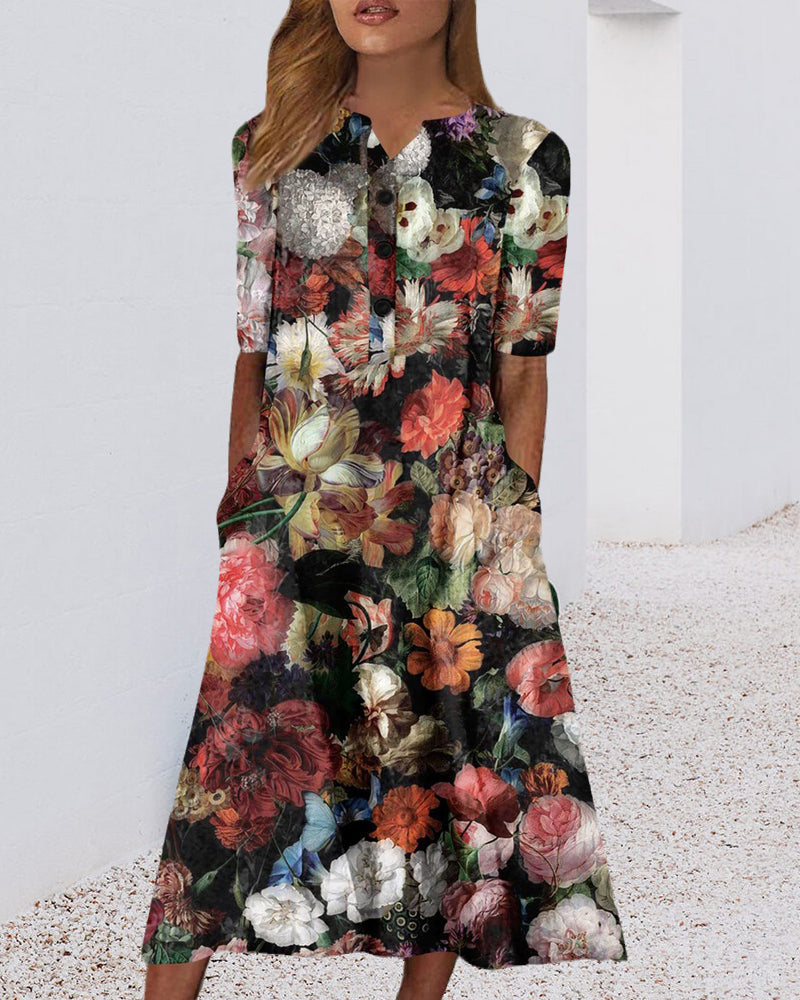 Kjole i blomsterprint med lomme