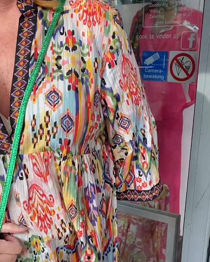 Elegant lang kjole med V-hals