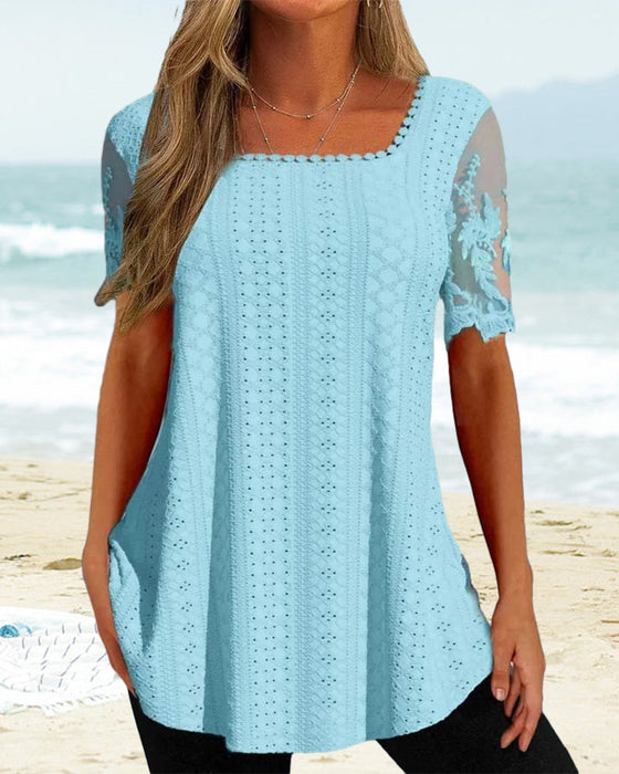 Hul broderibluse i kortermet