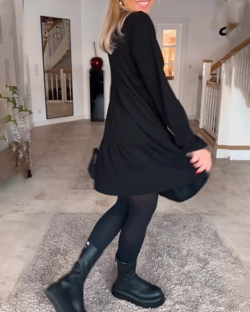 Enkel ensfarget langermet kjole