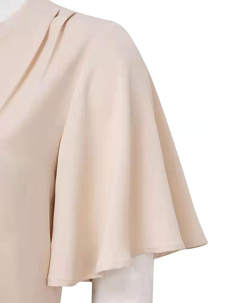 Topp med elegante folder