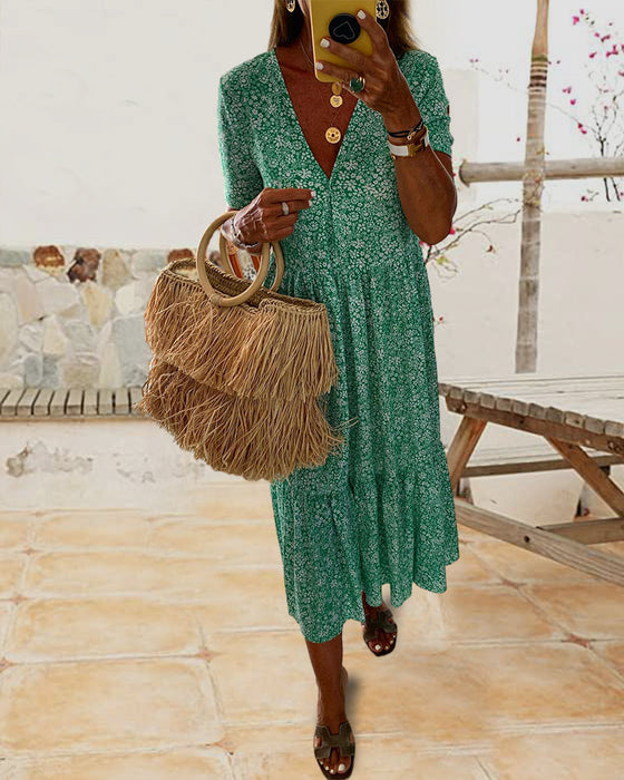 V-hals kjole med blomstertrykk