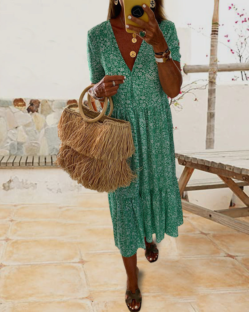 V-hals kjole med blomstertrykk