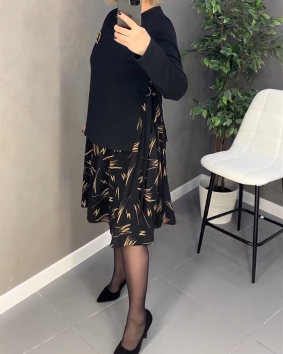 Løs og avslappet printkjole med rund hals