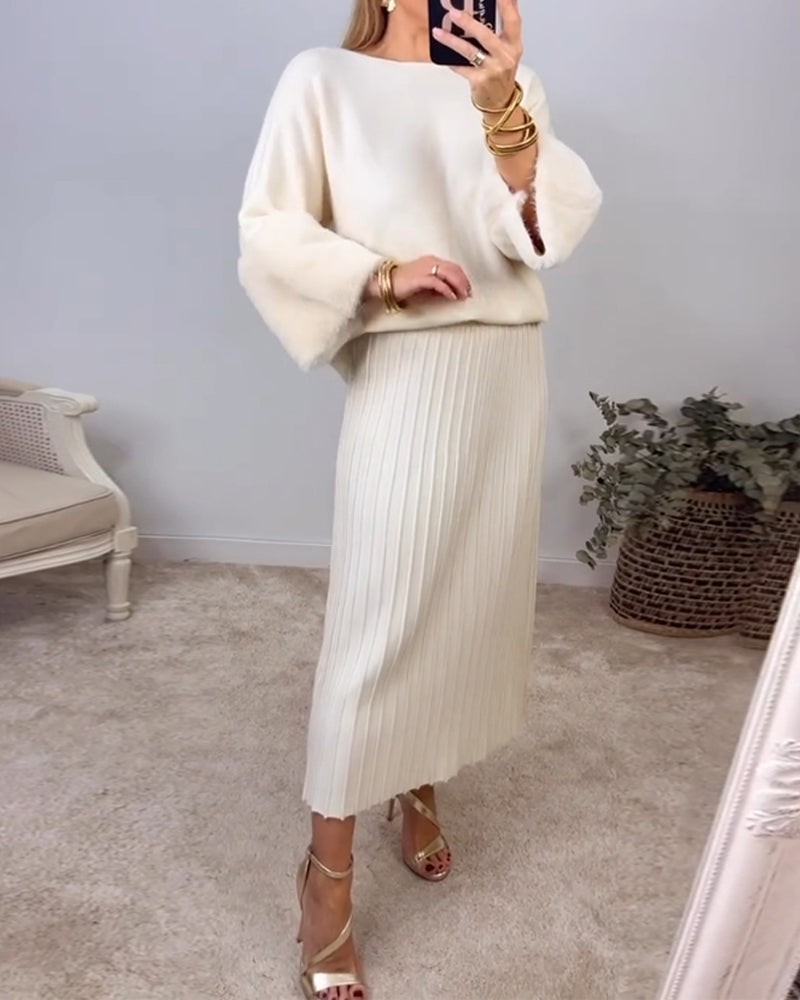 Elegant ensfarget genser med lange ermer