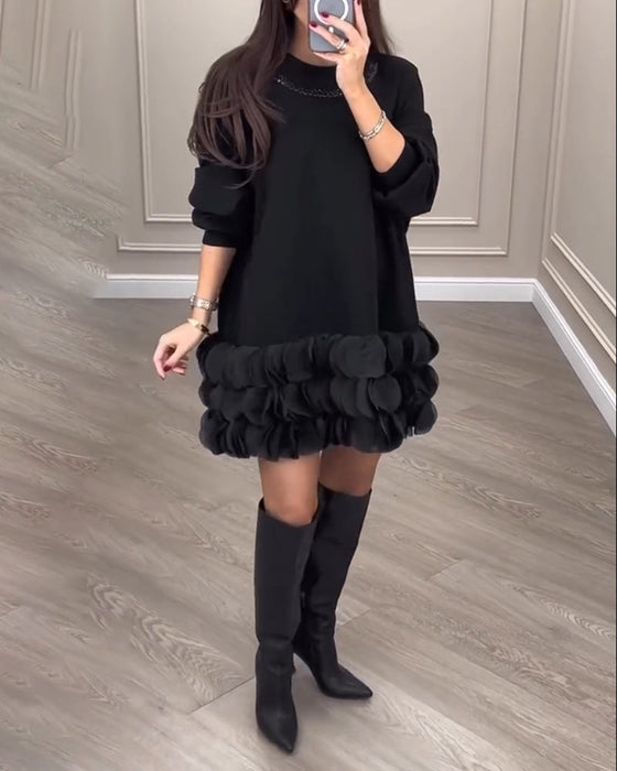 Elegant kjole med patchwork-blader