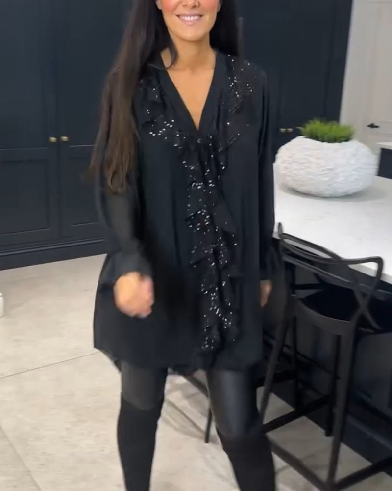 Bluse med volanger og elegant stil