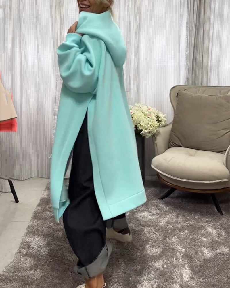 Løse hettegensere med sliss og lange ermer