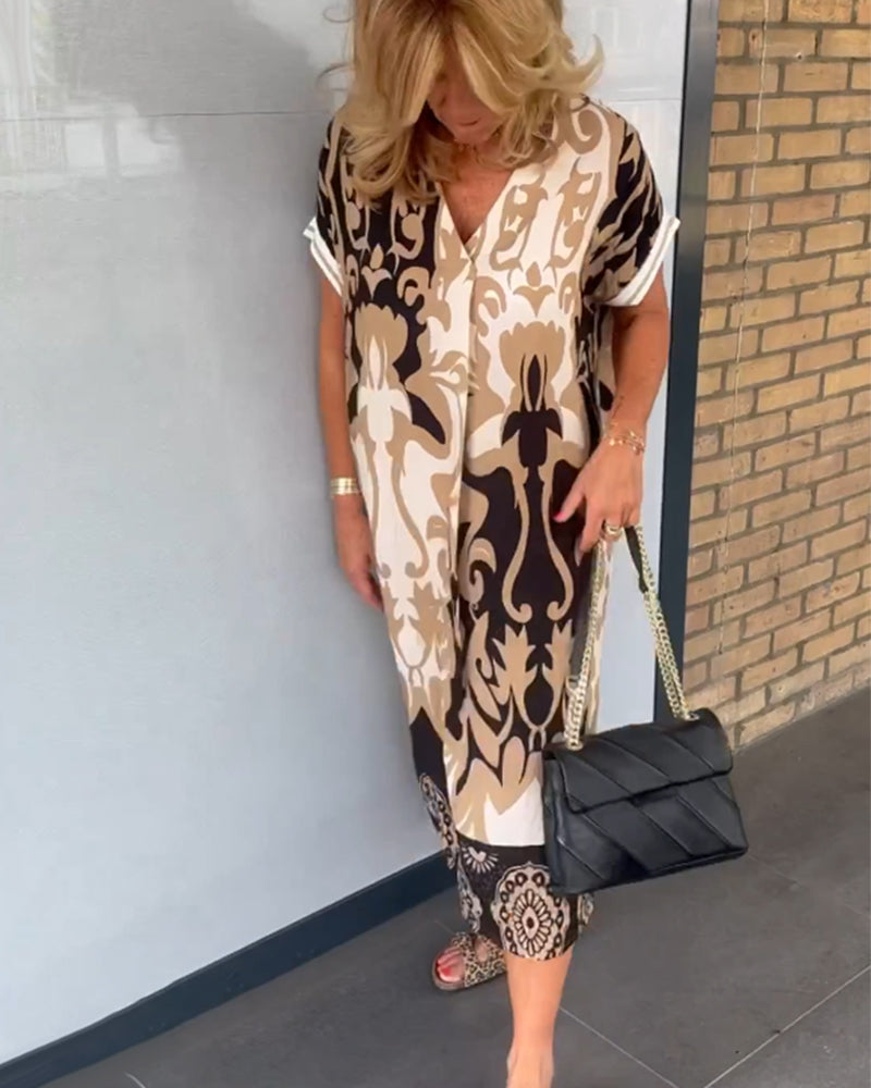 V-hals kjole med geometrisk trykk