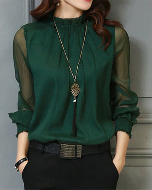 Ensfarget bluse med lanternearm