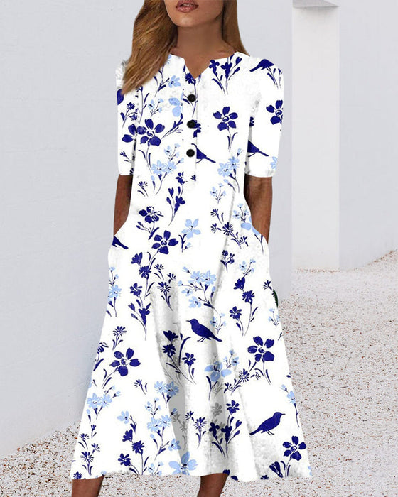 Kjole i blomsterprint med lomme