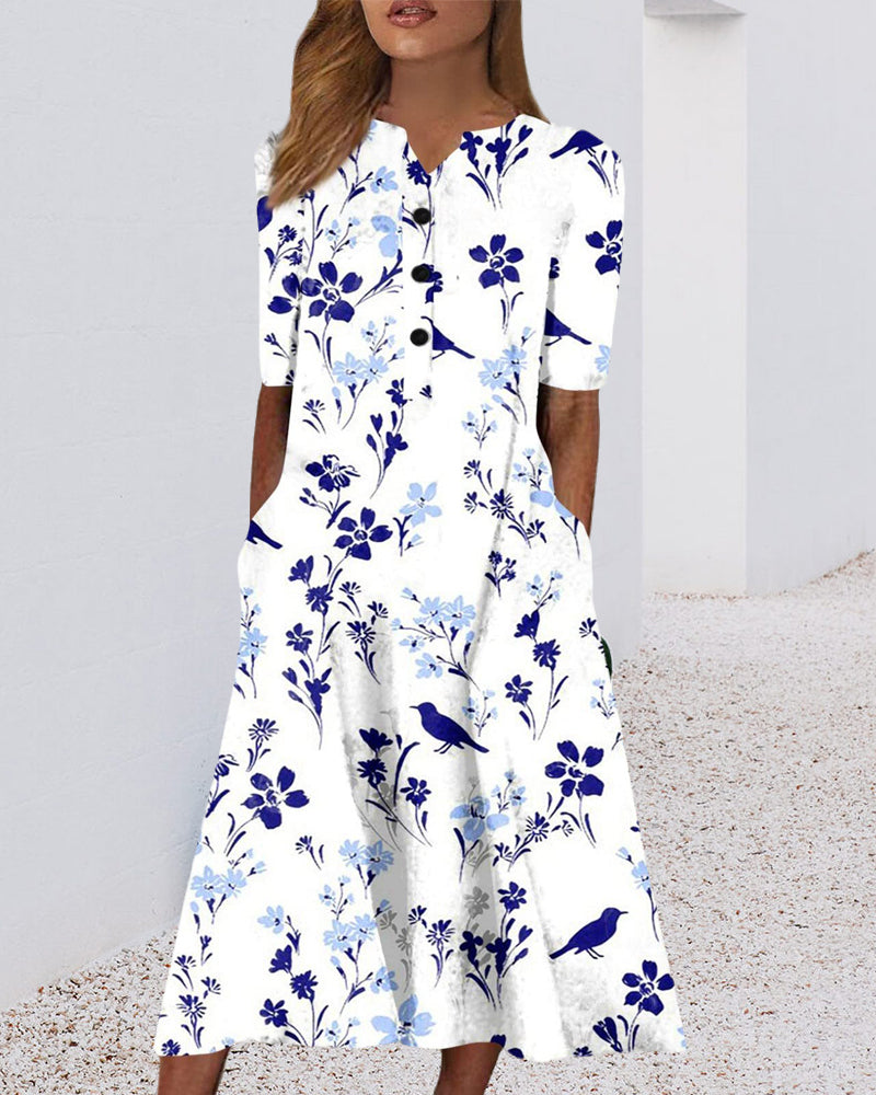 Kjole i blomsterprint med lomme