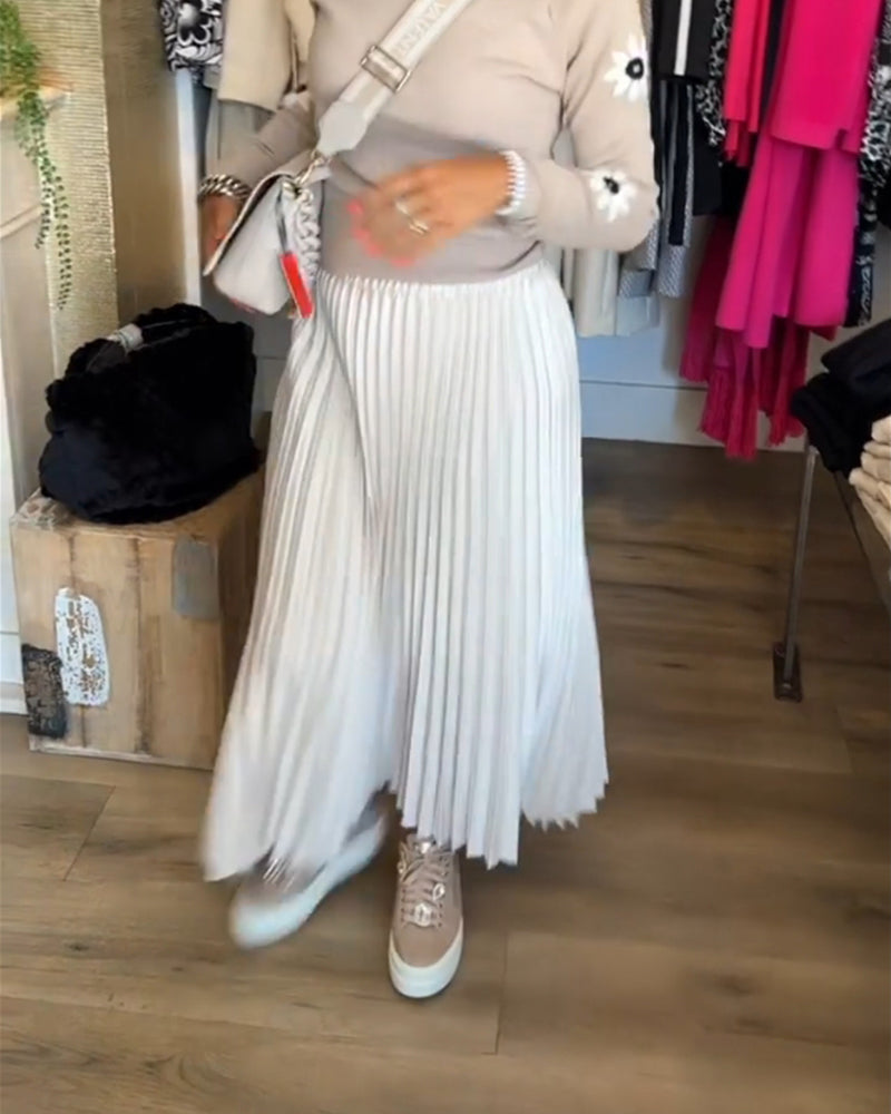 Plissert ensfarget kjole