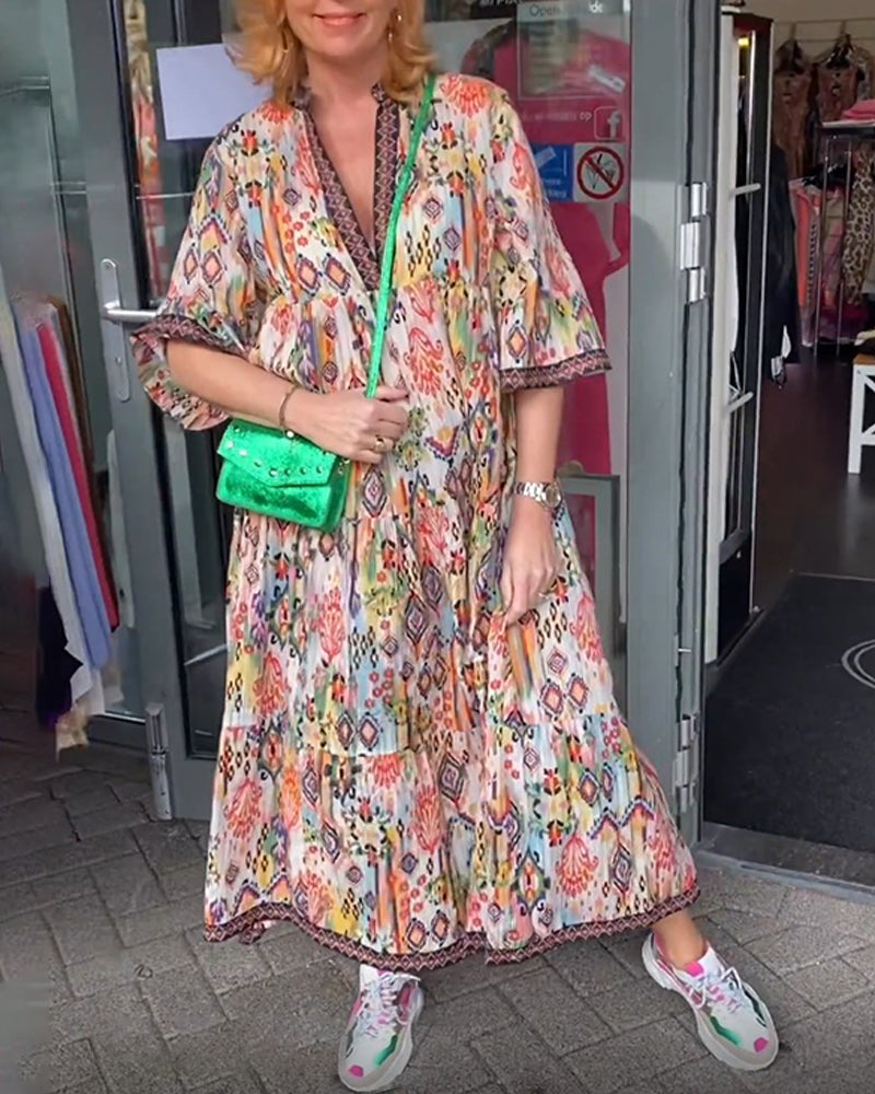 Elegant lang kjole med V-hals