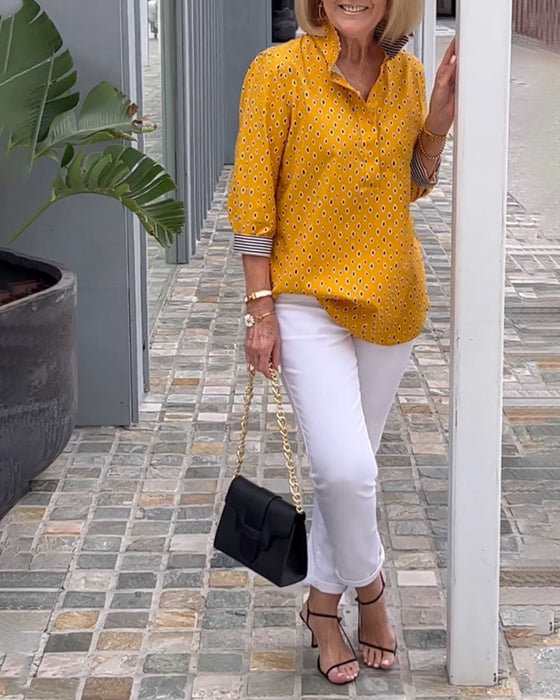 Prikkete jakkeslagsskjorte med 3/4-ermer