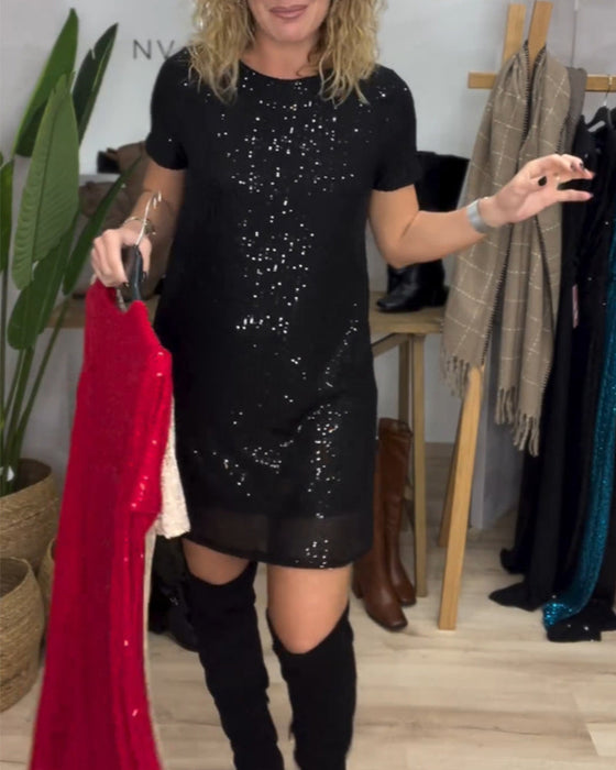 Elegant kjole med rund hals og paljetter