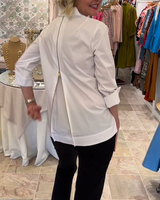 Ensfarget bluse med glidelås