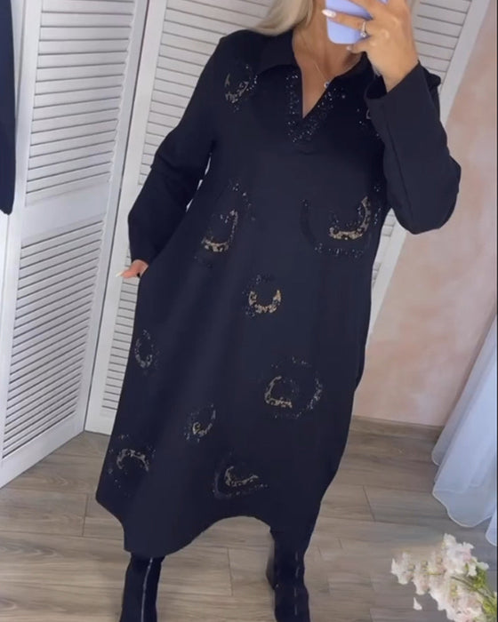 Midikjole med revers og lange ermer