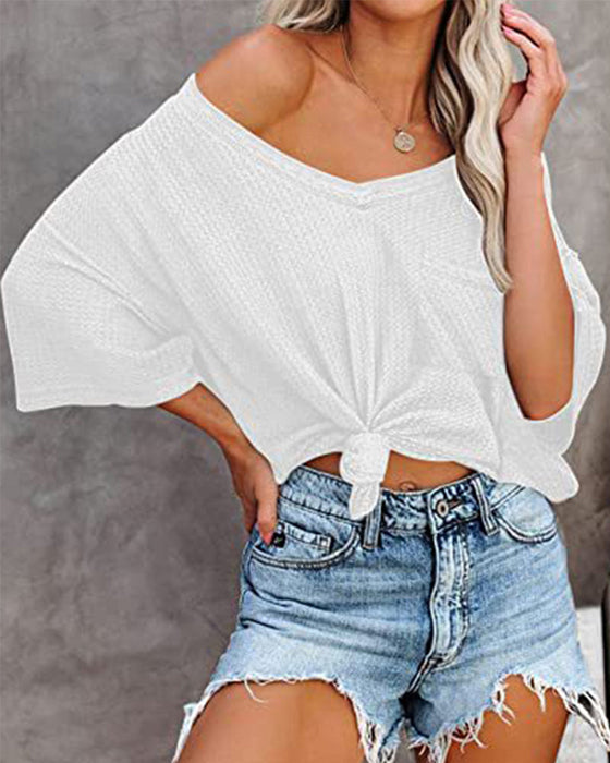 Kortermet t-skjorte med V-halslomme