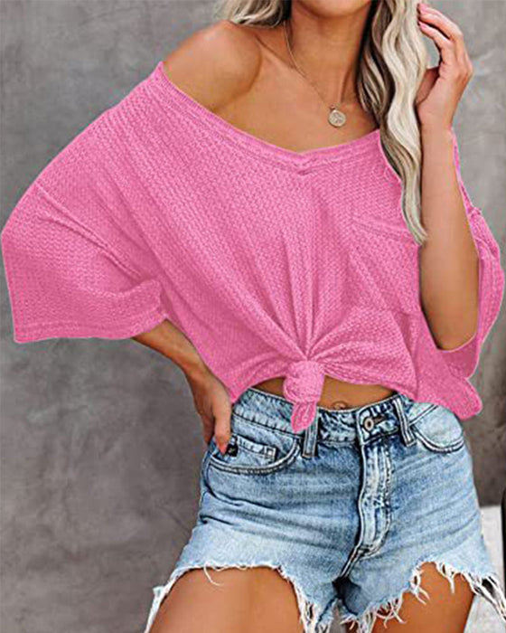 Kortermet t-skjorte med V-halslomme