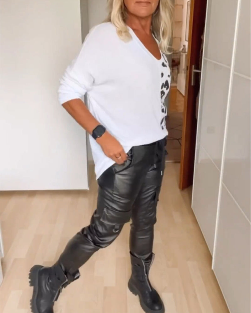 Topp med V-hals og fargeblokk