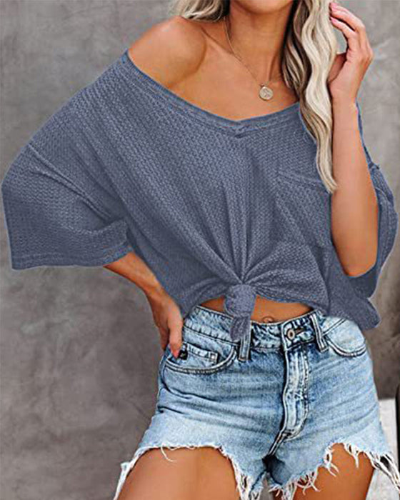 Kortermet t-skjorte med V-halslomme