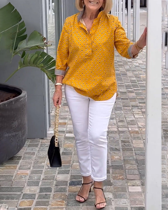 Prikkete jakkeslagsskjorte med 3/4-ermer