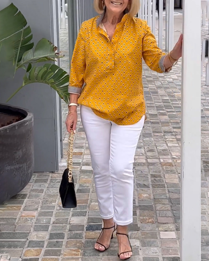 Prikkete jakkeslagsskjorte med 3/4-ermer