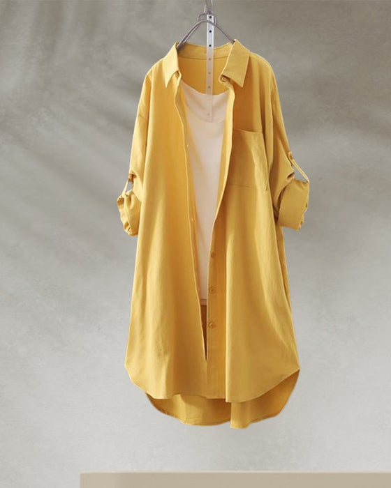 Ensfarget bluse med lange ermer