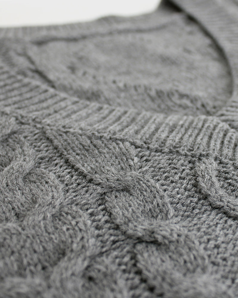 Ermeløs genservest med v-hals