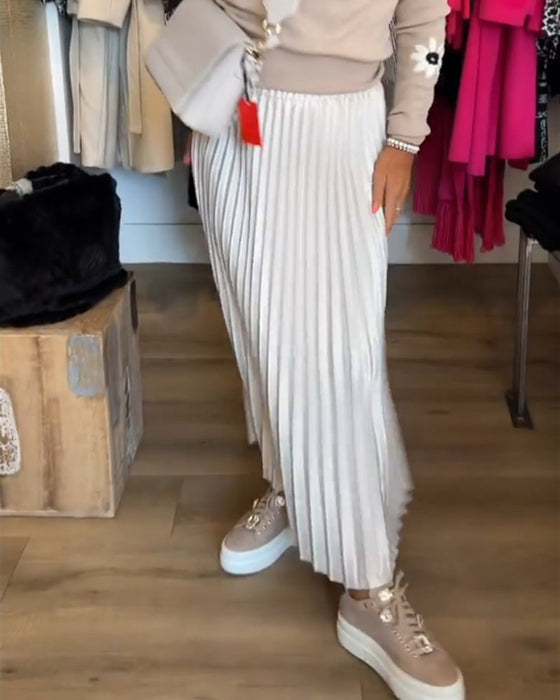 Plissert ensfarget kjole