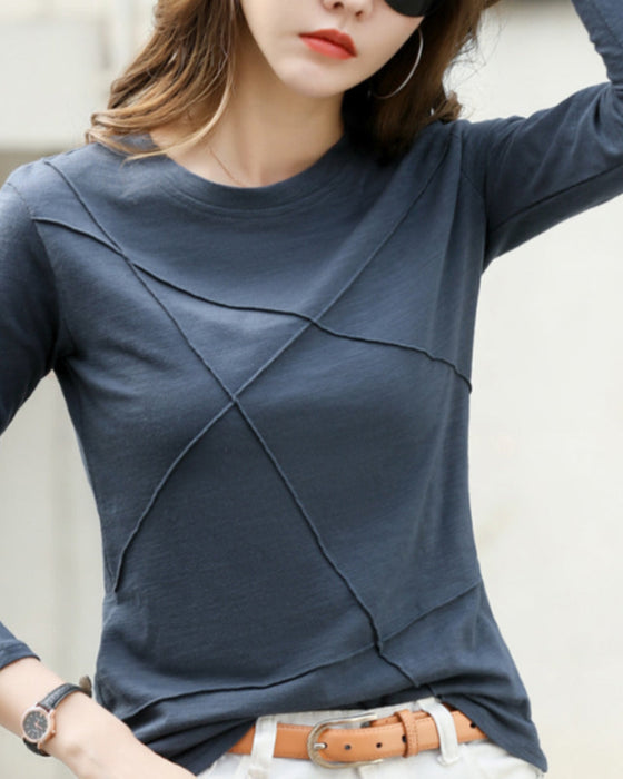 Ensfarget topp med lange ermer med rund hals