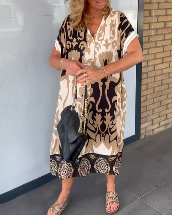 V-hals kjole med geometrisk trykk