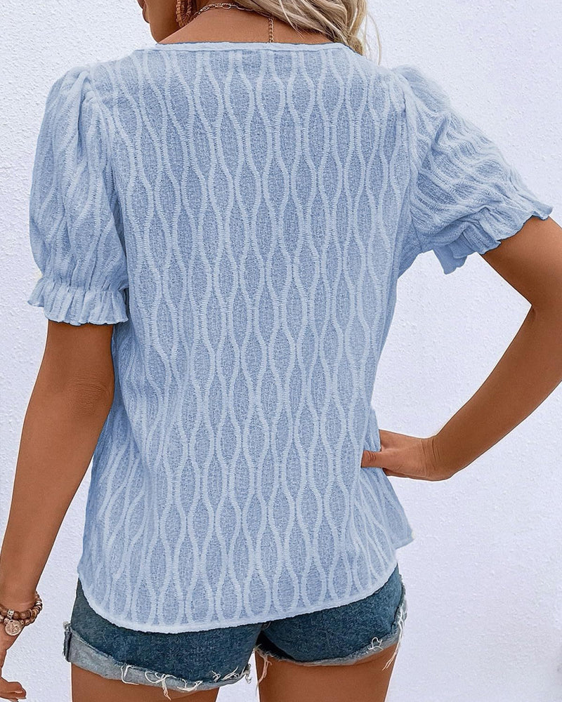 V-hals puffermet ensfarget topp