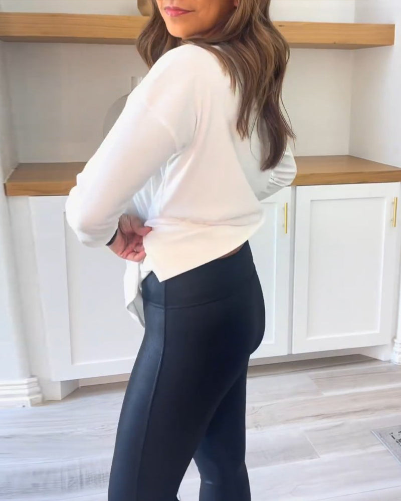 Ensfarget topp med lange ermer