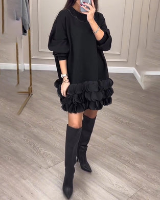 Elegant kjole med patchwork-blader