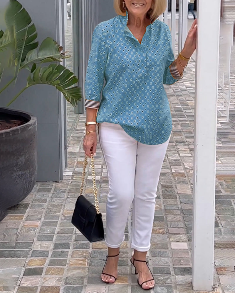 Prikkete jakkeslagsskjorte med 3/4-ermer