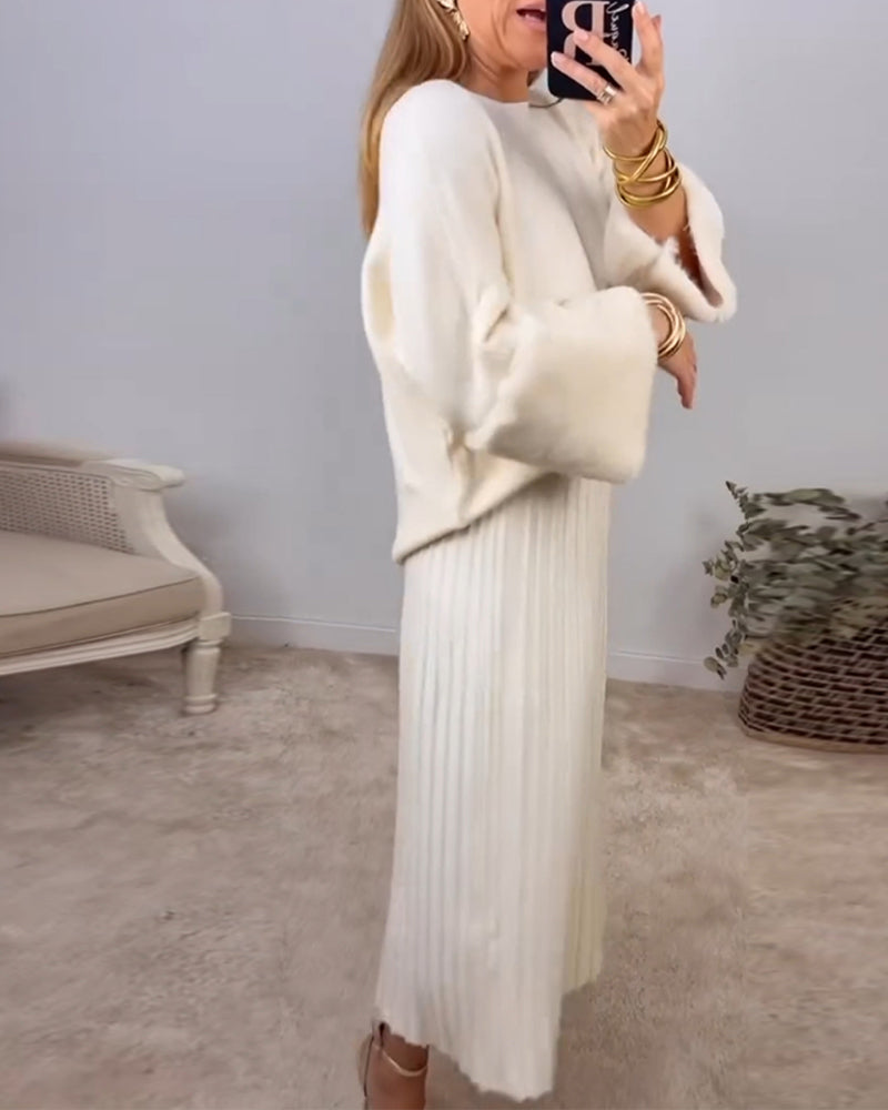 Elegant ensfarget genser med lange ermer