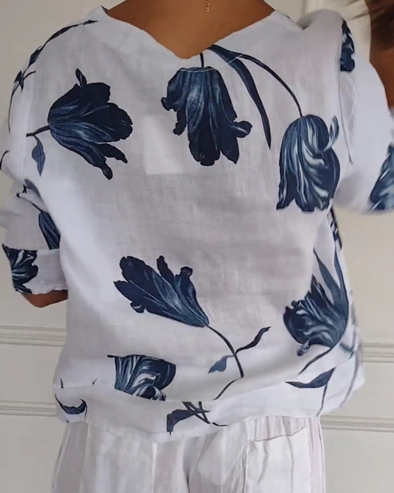Topp med blomstertrykk i bomull og lin