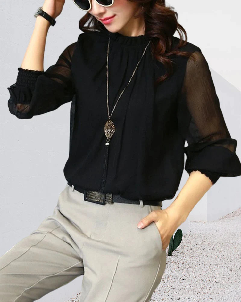 Ensfarget bluse med lanternearm