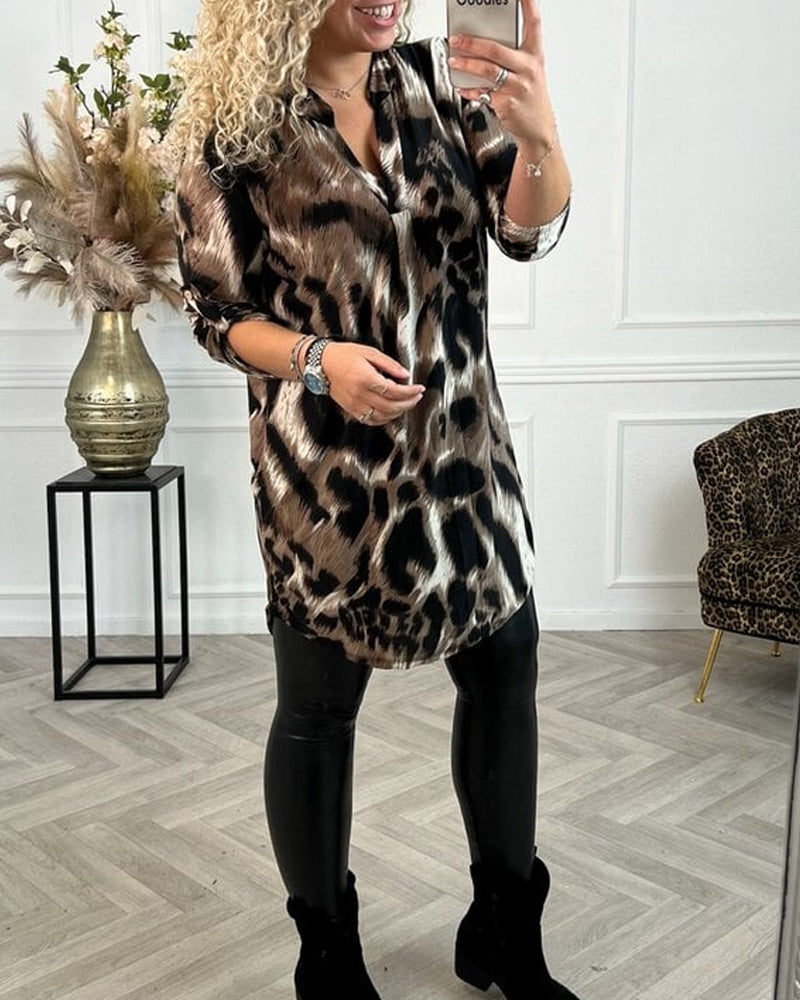 Bluse med eleganse og leopardprint