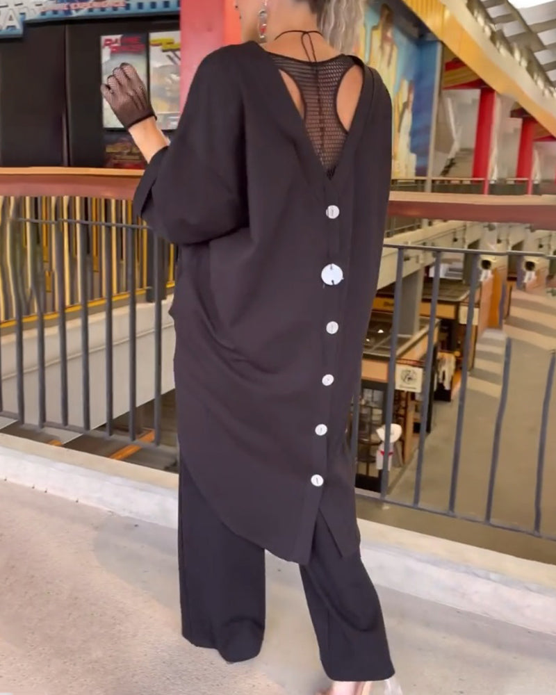 Topp med løs passform og lange ermer