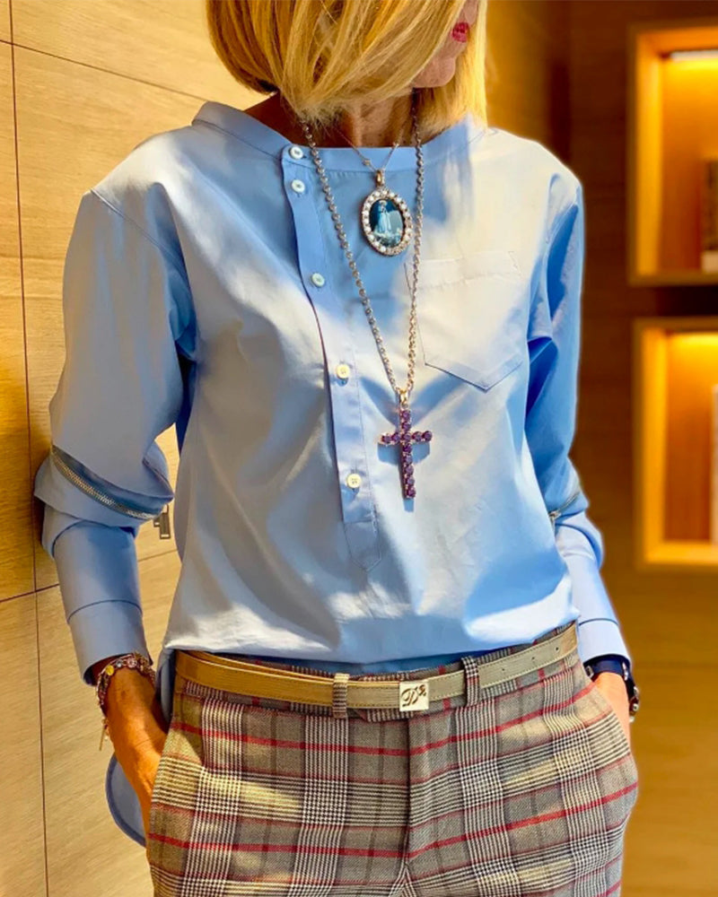 Ensfarget uregelmessig topp med knapper