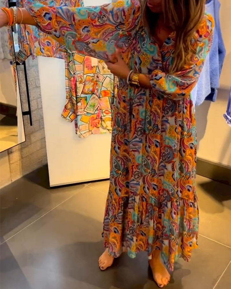 Lang kjole med A-linjet trykk og V-hals