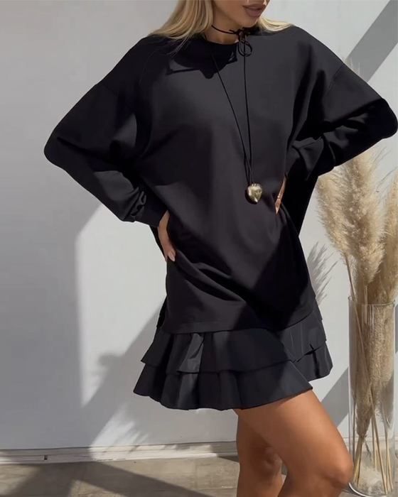 Løs ensfarget kjole med patchwork