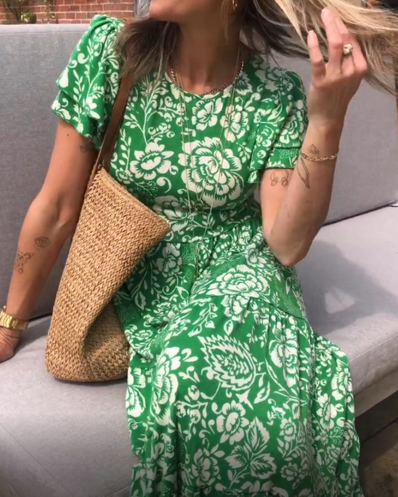 Kortermet lang kjole med blomstertrykk